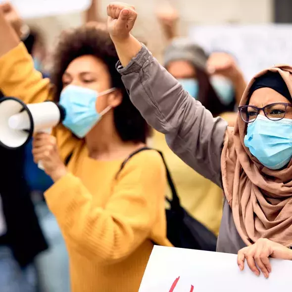 Females in Protest - Wearing Face Masks