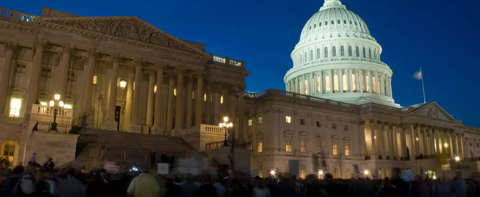 The U.S. Capitol Building at Night - Crowd of People Outside