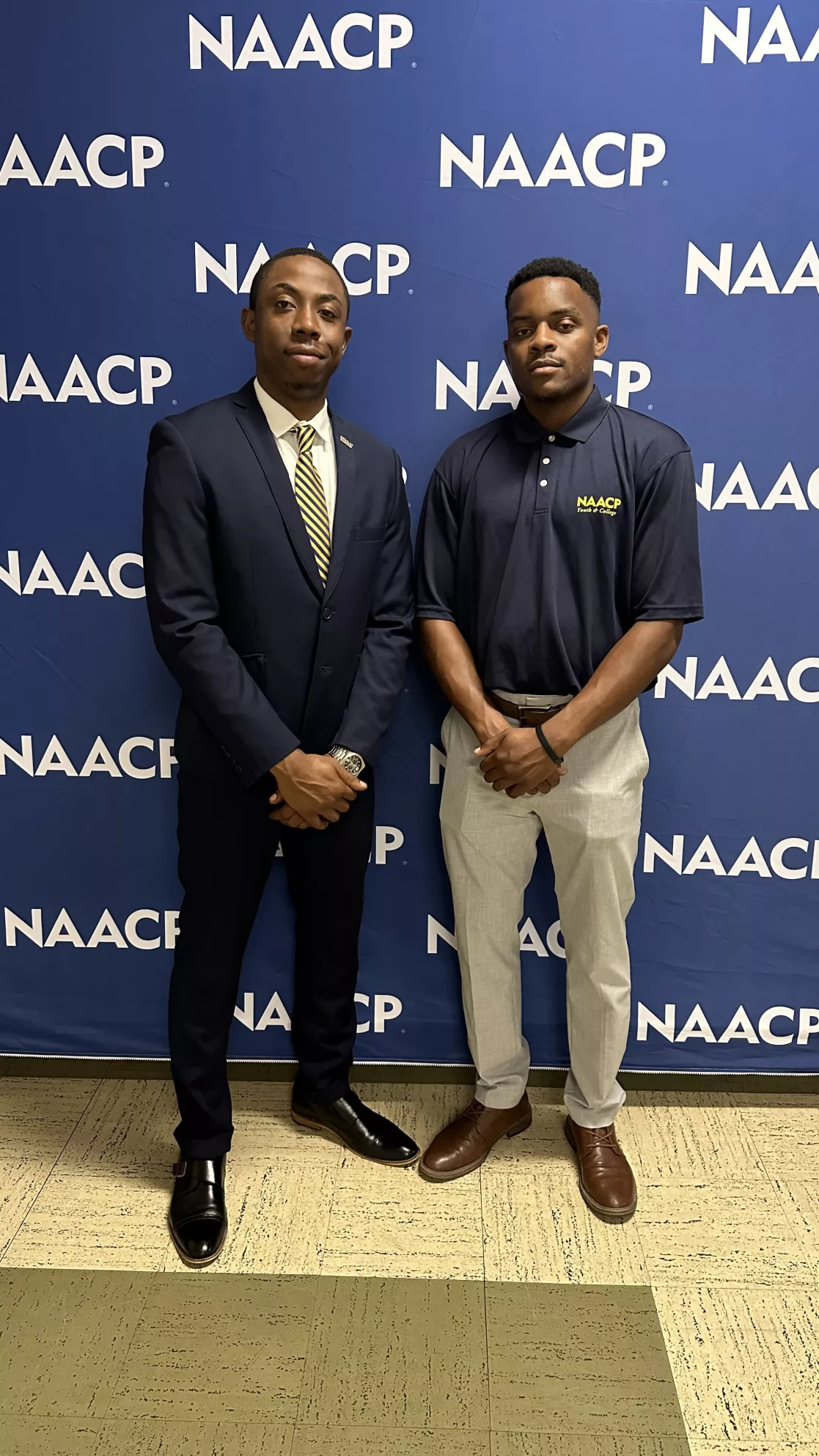 NAACP Field Organizer Jimel Caliste and 2024 NAACP Democracy Fellow Jalen Vince pose for a photo.