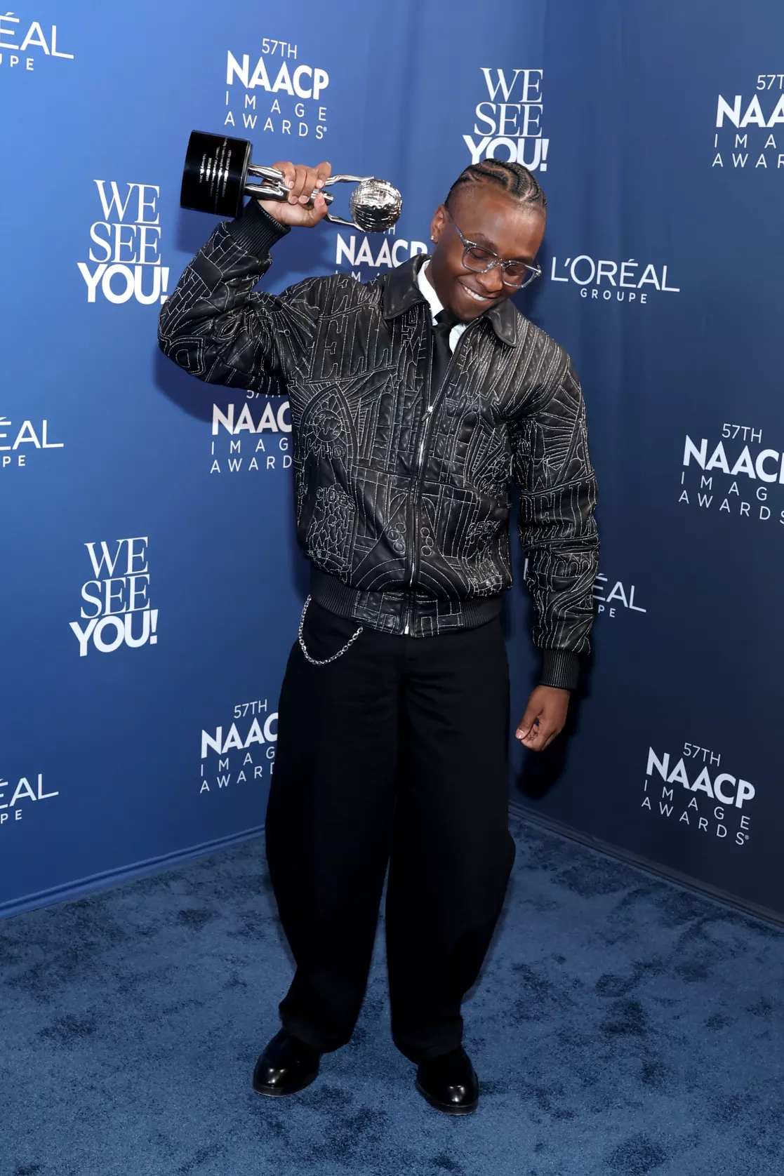 Miles Caton holds his Image Award trophy
