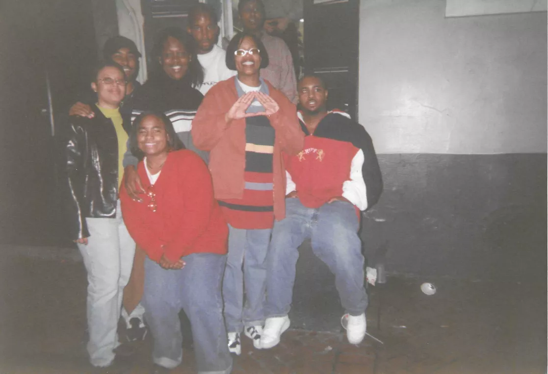 A group of Black women and men pose for a photo in New Orleans.