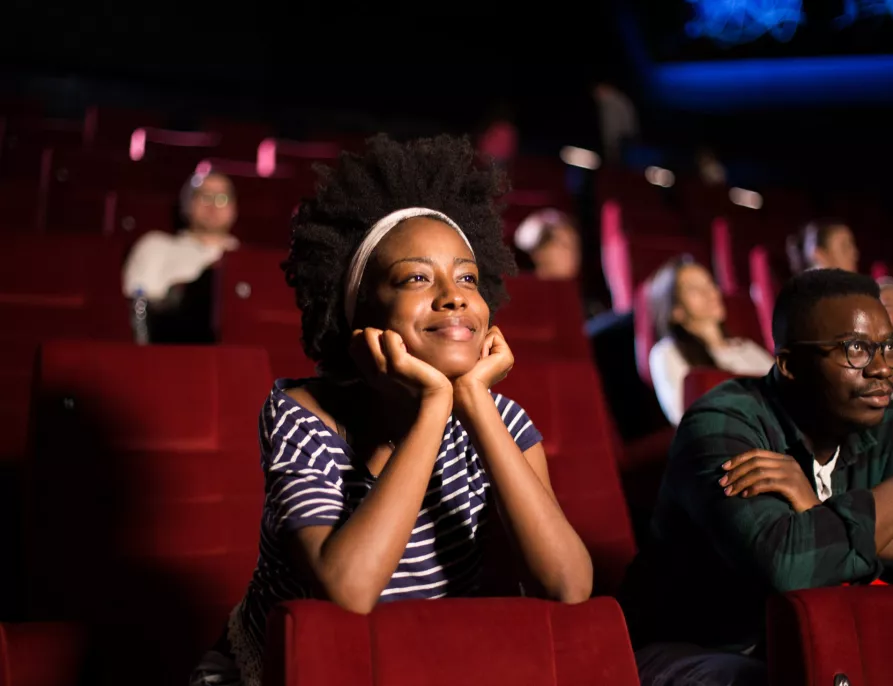 Group with Happy Expressions at the Movie Theater