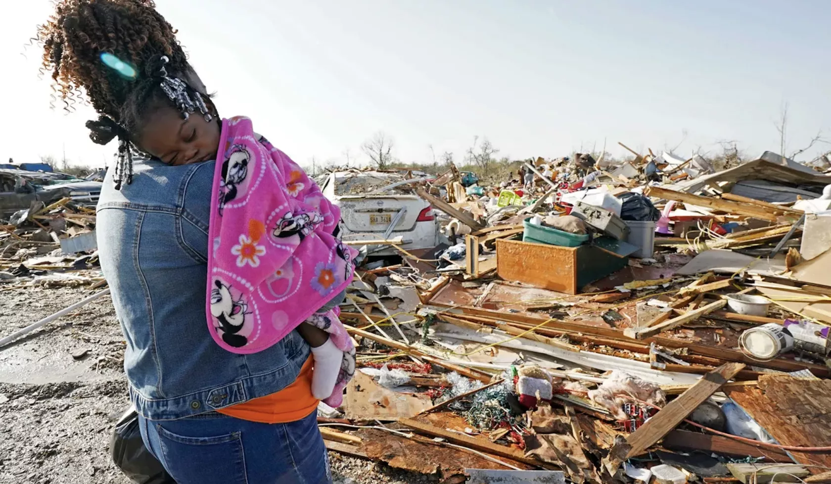 Woman holding Baby in Mississippi after tornado