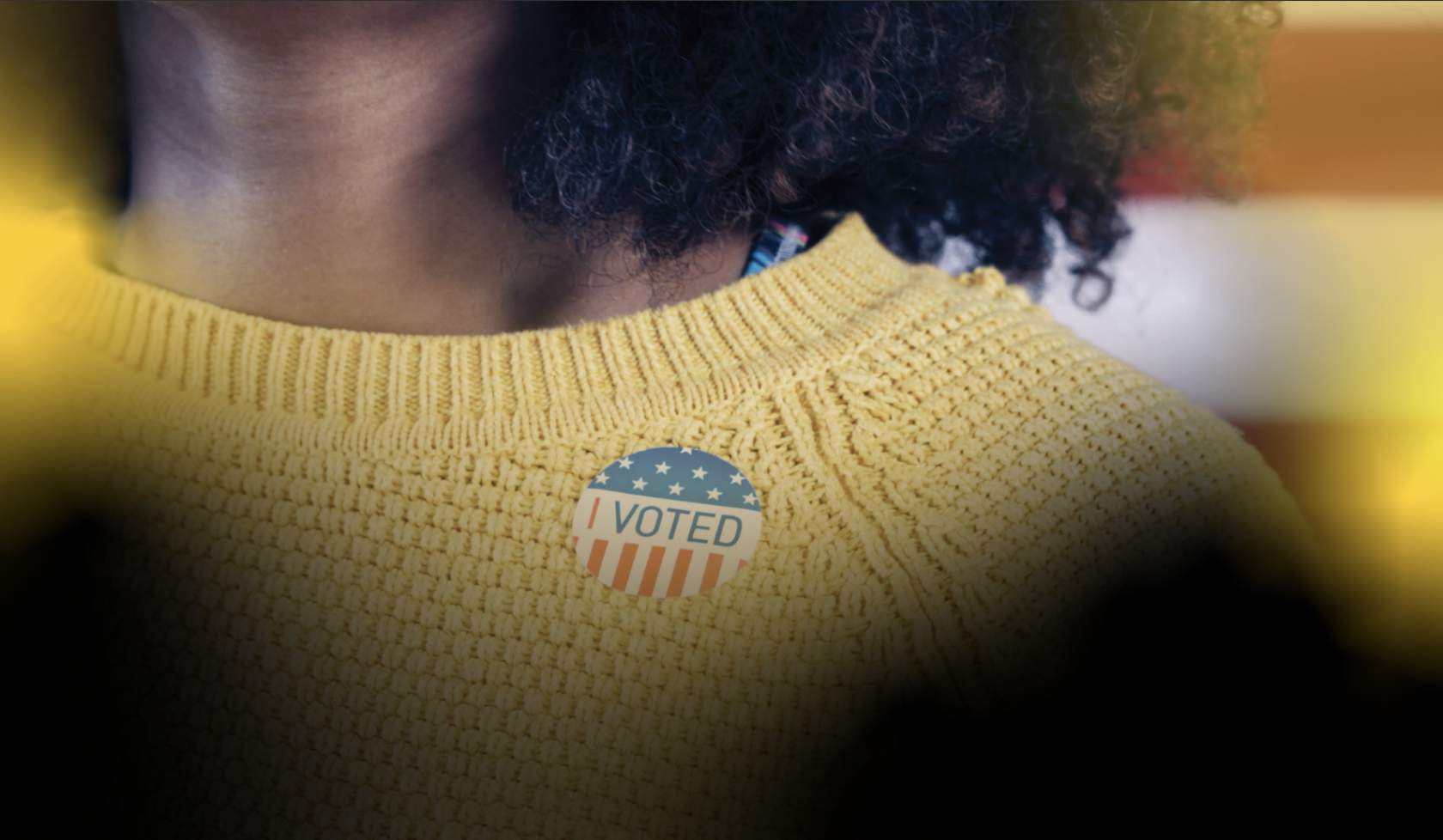 Black Voter Day Hero - Black woman wearing I Voted Sticker