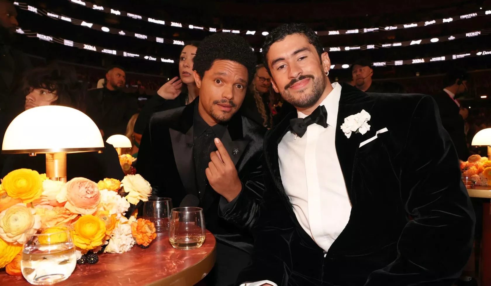 Comedian Trevor Noah and musician Bad Bunny pose for a photo at the 68th Annual Grammy Awards.