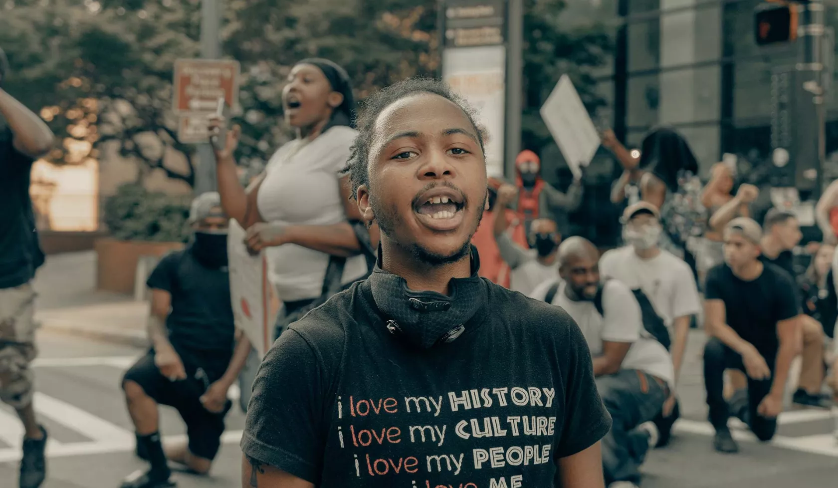 Young Black Male - Outdoors - in protest or rally - speaking