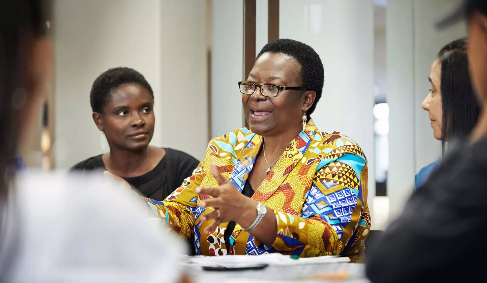 Black Female Speaking in Meeting