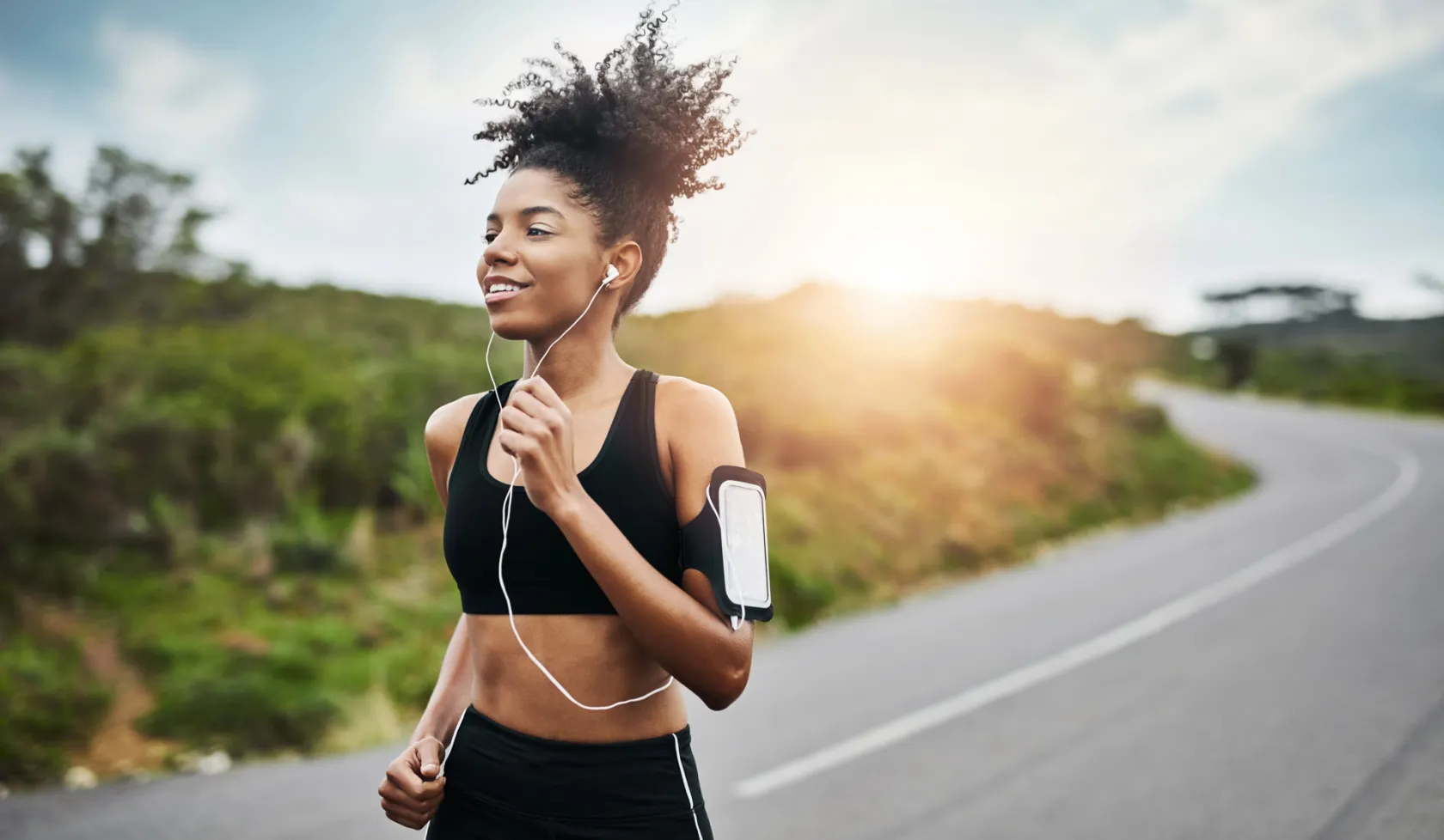 Young Black Female Athlete Outside on a Run