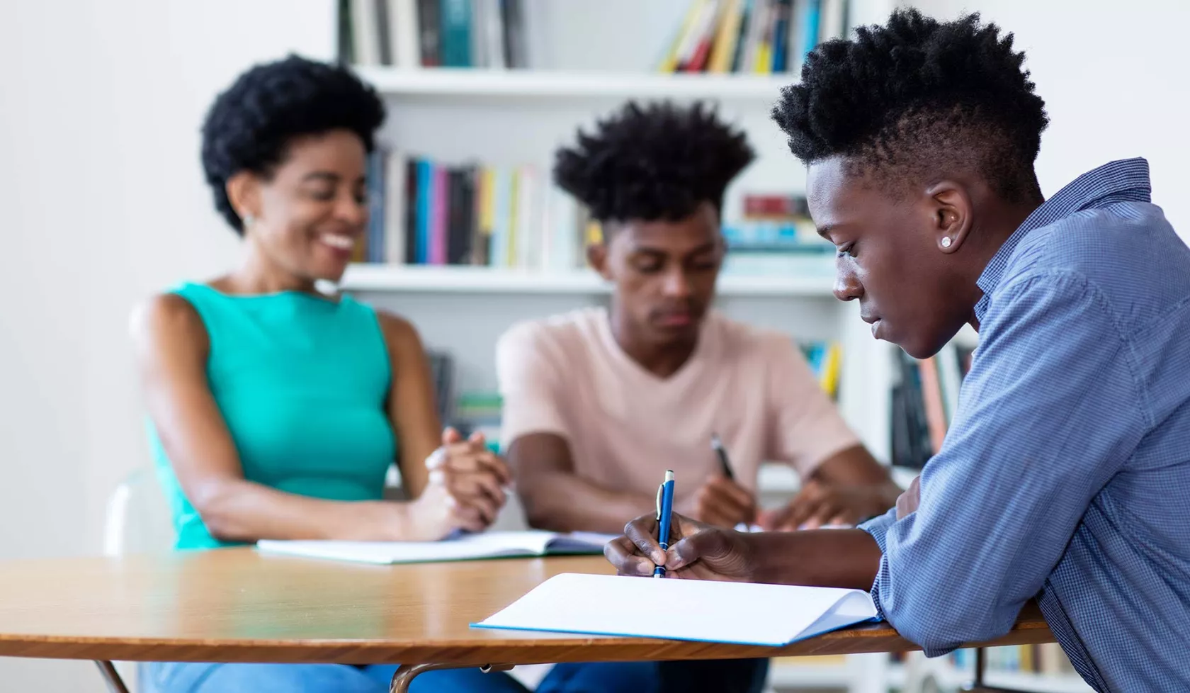 Black Students Doing Work at Desk