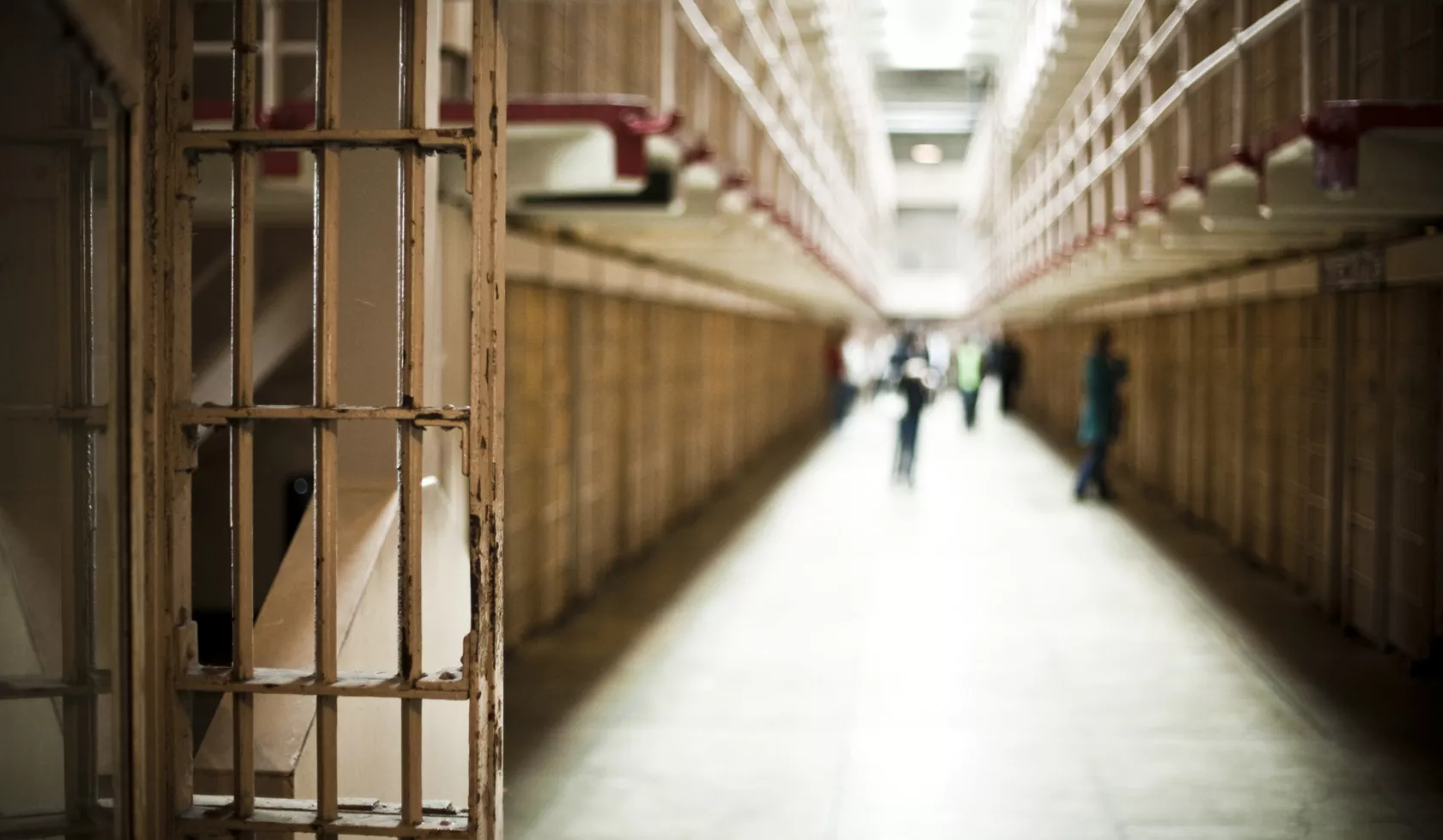Long Prison Hallway with Illuminated Sillhouettes