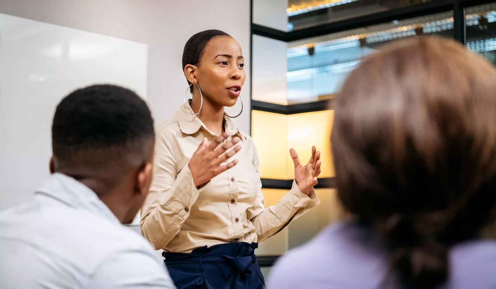 Black Female Leading Presentation in Meeting