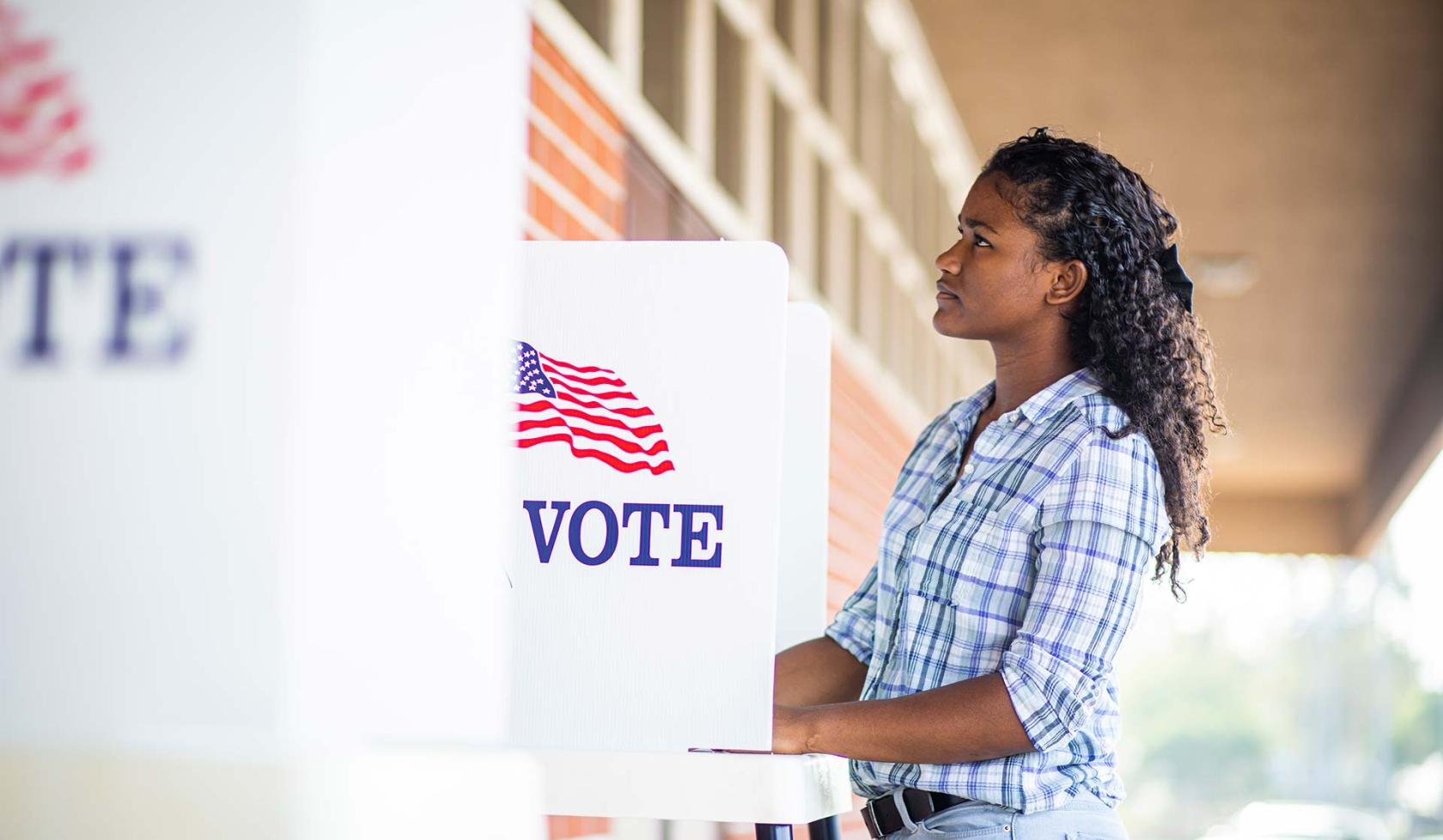 Young Black Female at Voting Booth