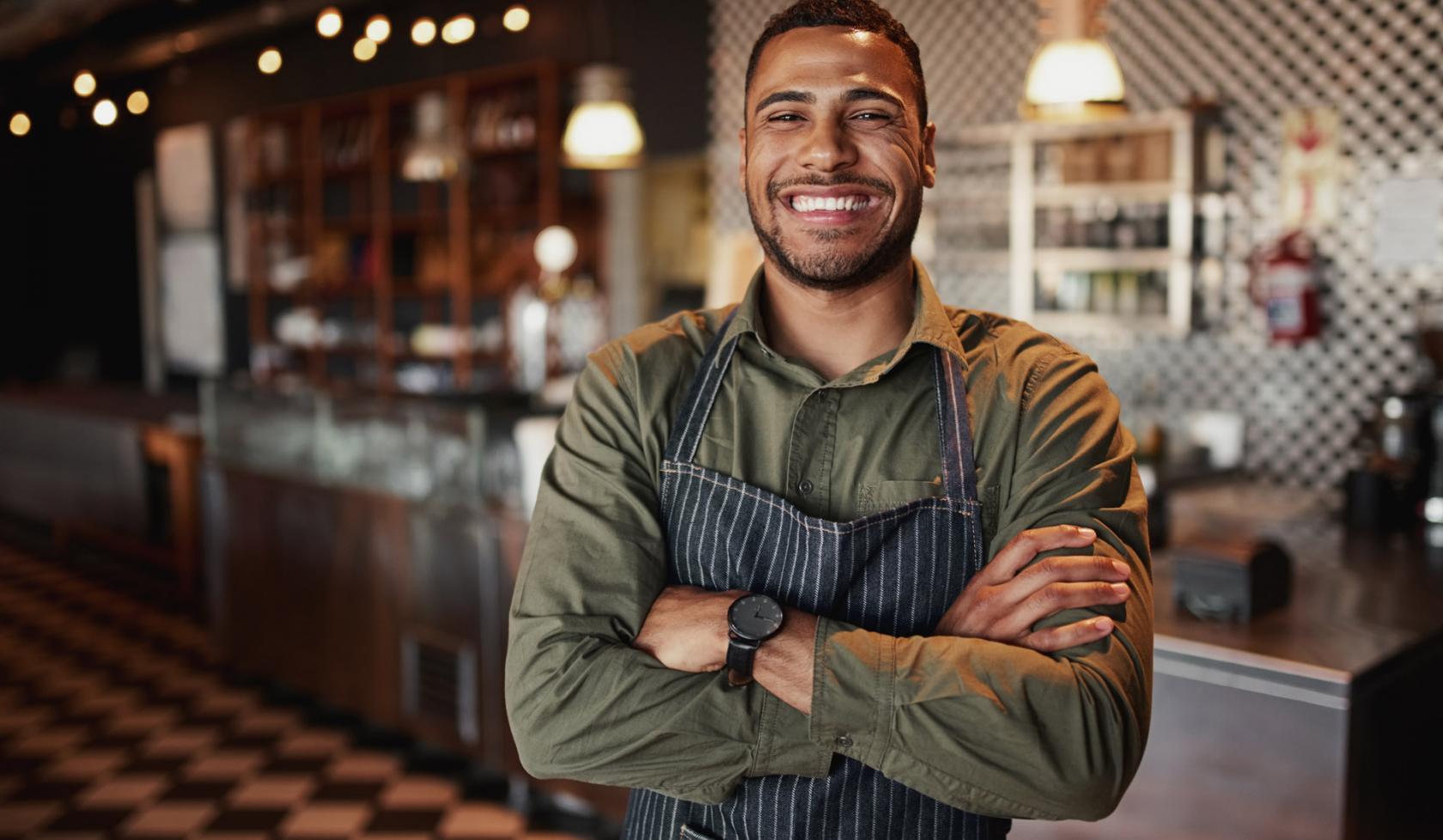 Smiling Restaurant Worker Wearing Apron