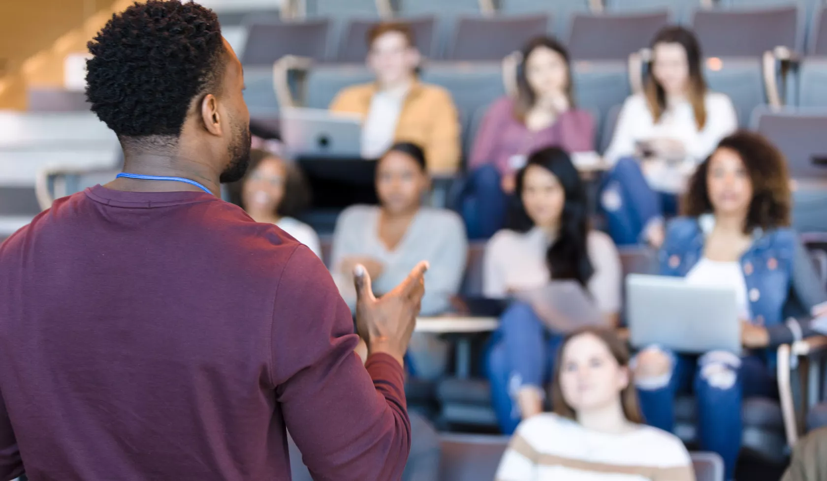 Black Man Teaching a Classroom of Students