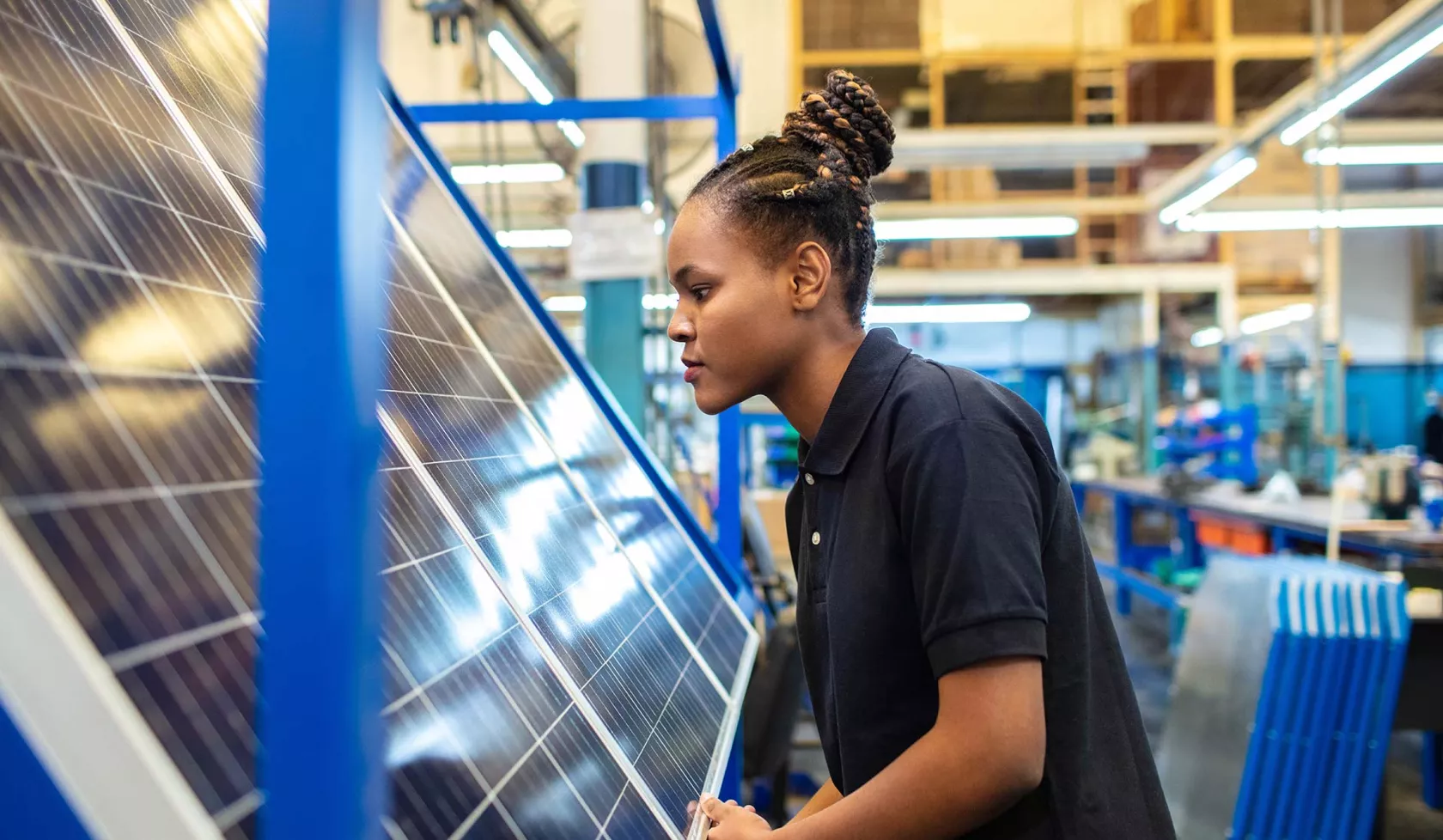 Black Female - Solo - in factory work environment