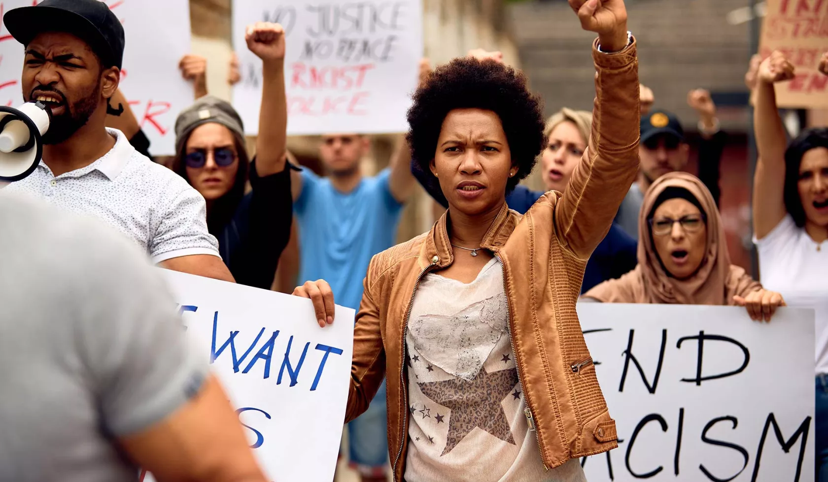 Black Female in Protest with Raised Fist