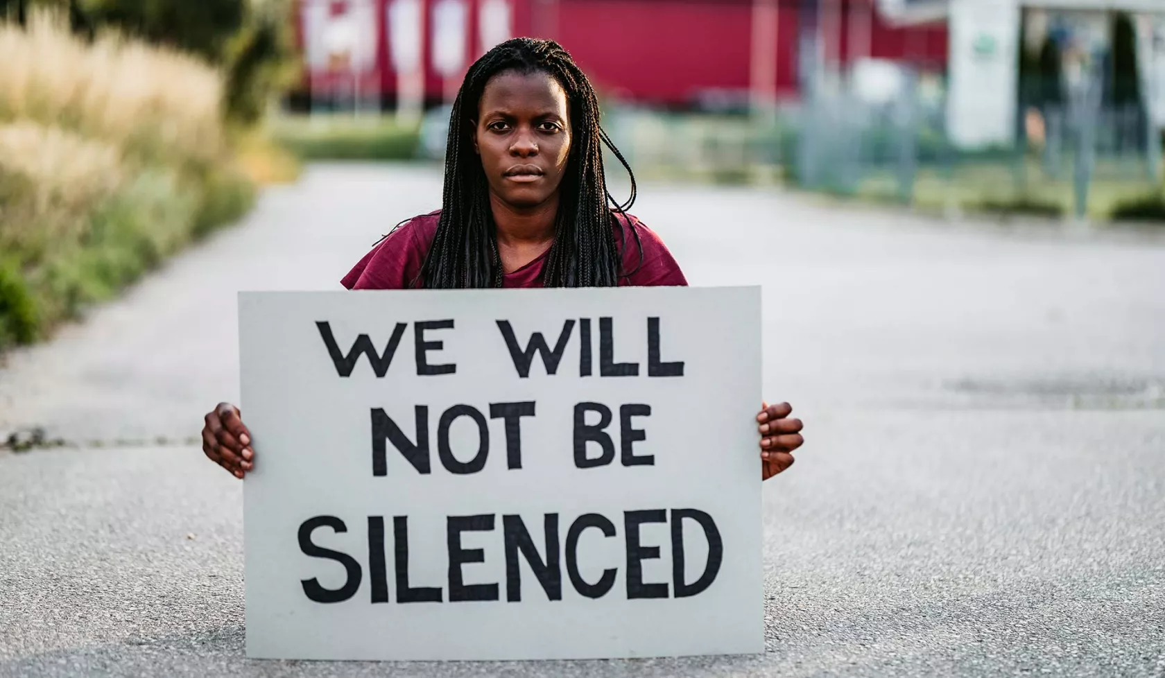 Black Female - Solo - with Sign "We Will Not Be Silenced"