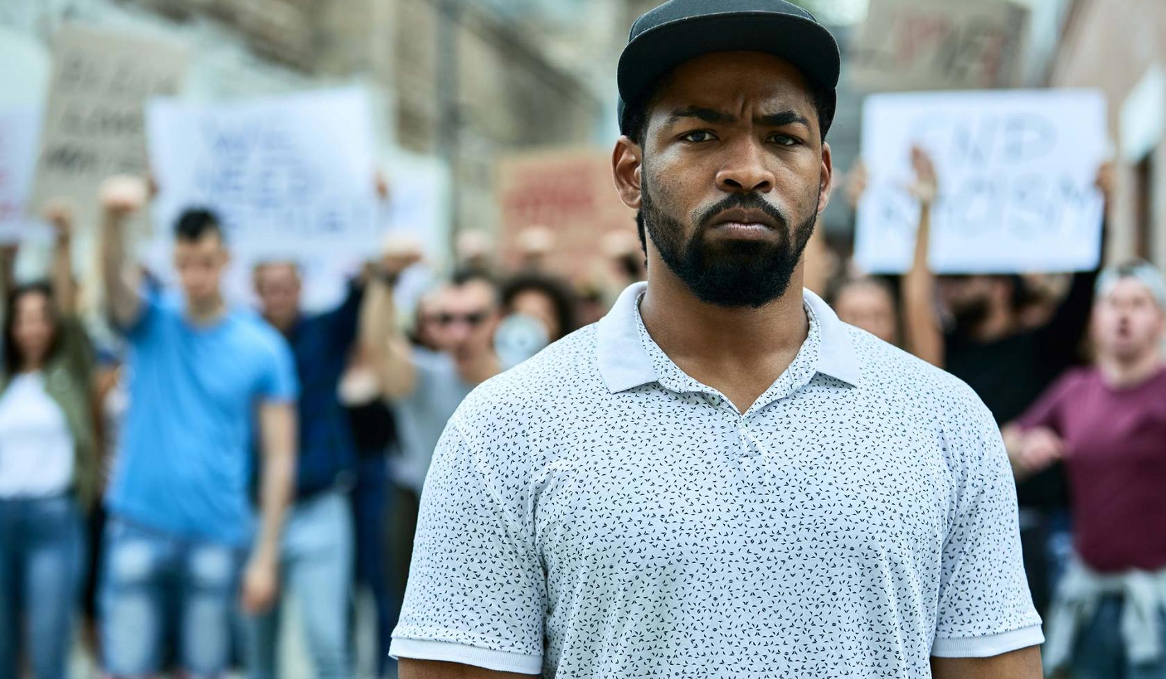 Black Man Standing in Solidarity with Protesters