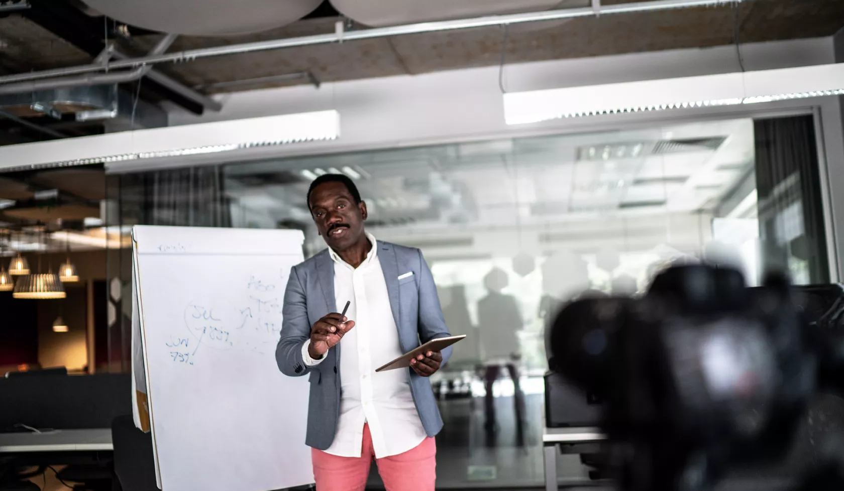 Black Businessman Giving a Presentation