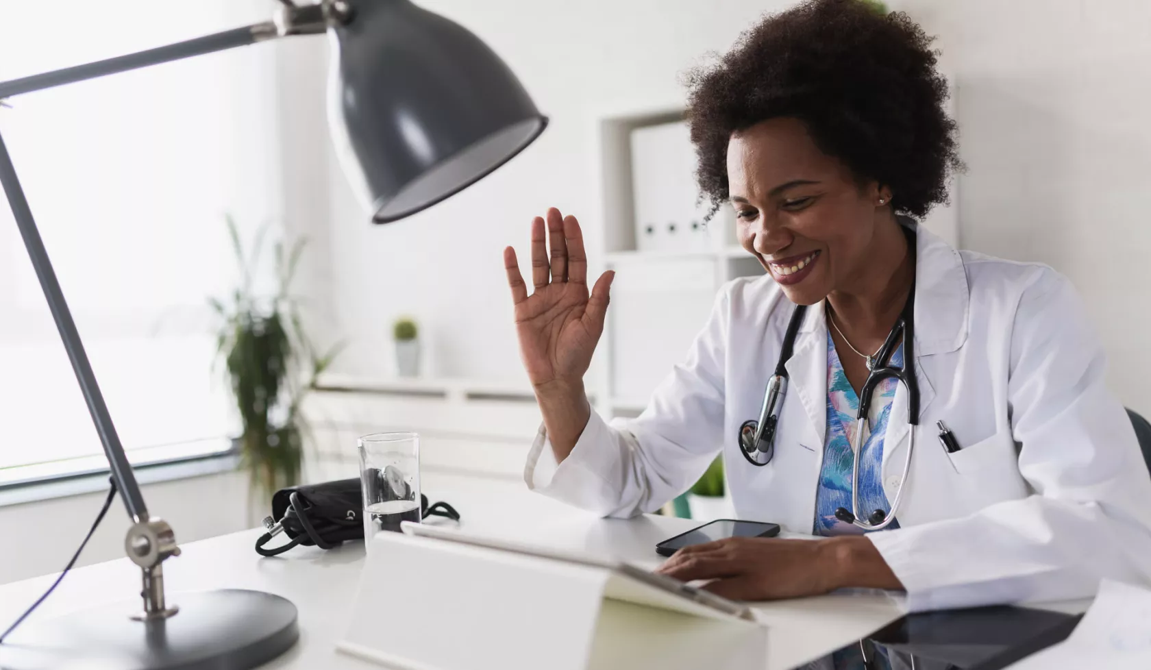 Black Doctor Having a Virtual Appointment - Indoors