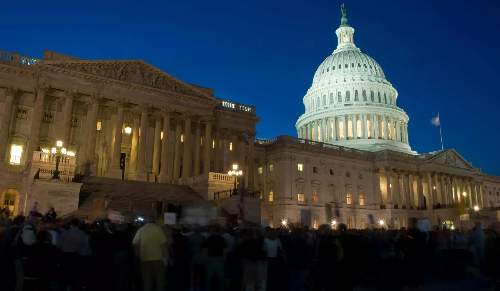 The U.S. Capitol Building at Night - Crowd of People Outside