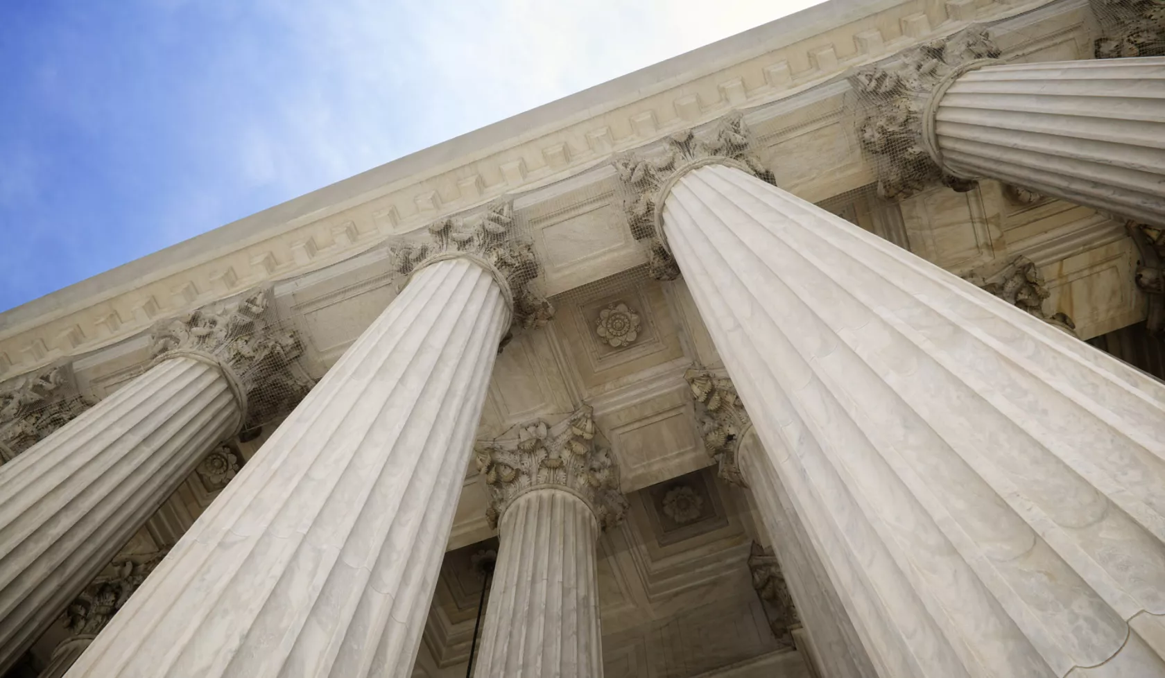 Looking Up at Marble Columns on Courthouse