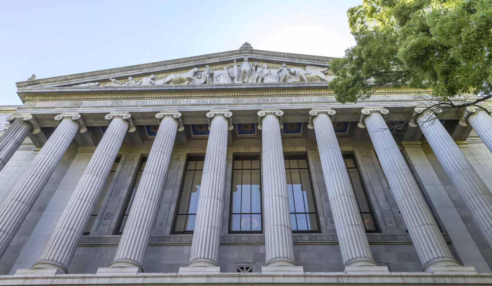 Looking Up at a Courthouse with Columns on a Summer Day