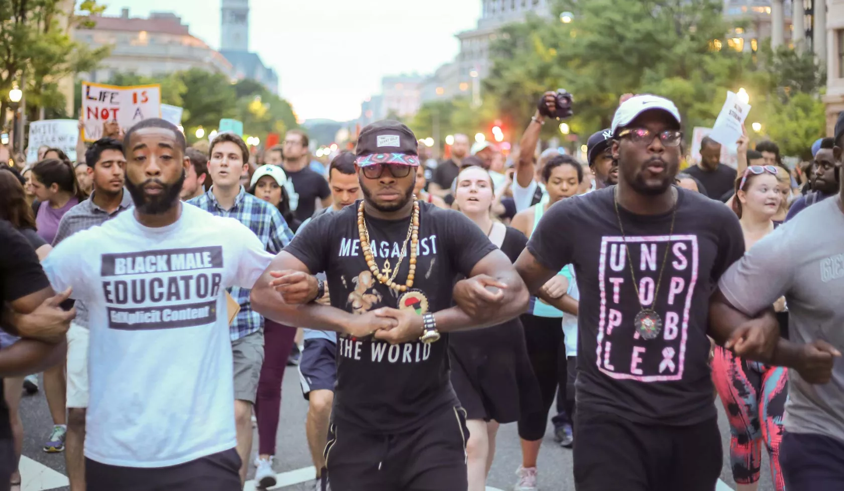 Black Men Locking Arms in Protest