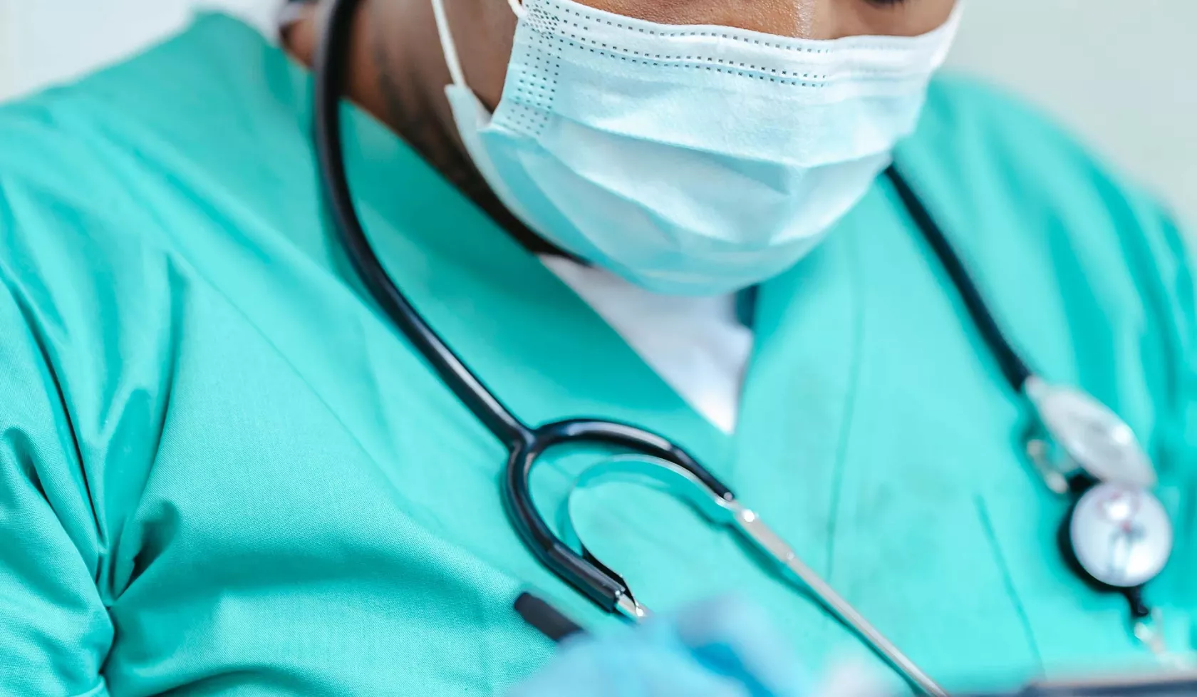 Black Female Nurse - in face mask