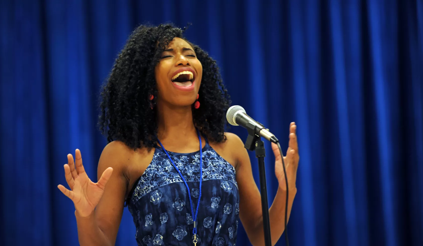 Girl singing in ACT-SO competition