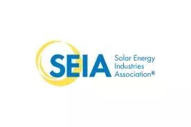 Yellow circular design behind large blue text reading SEIA, with smaller blue text to the right reading Solar Energy Industries Association