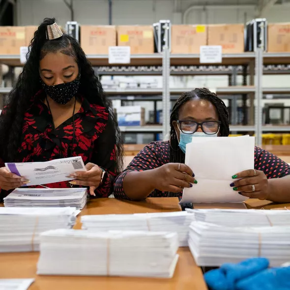 Black Female Election Workers - tallying election votes