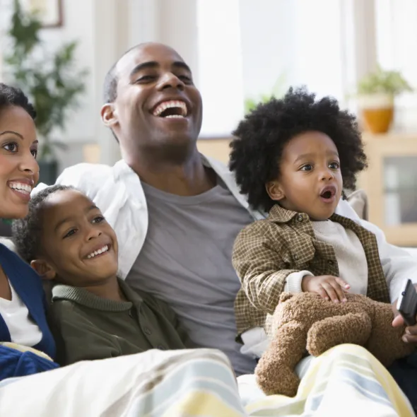 Happy Black Family in House