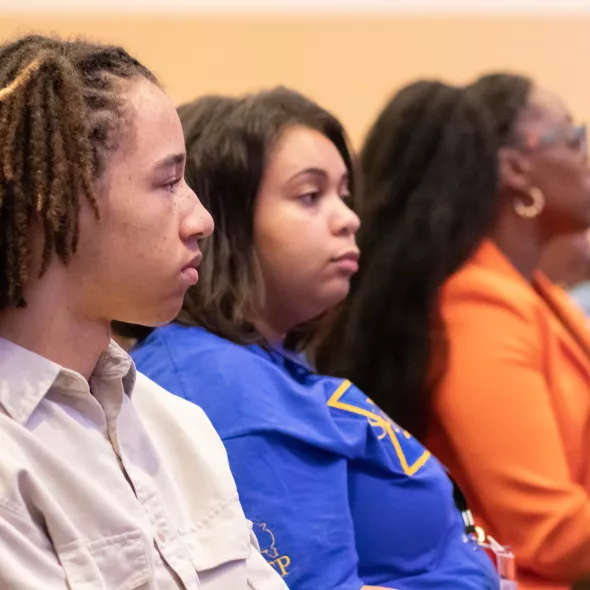 Youth Board Members sitting in meeting