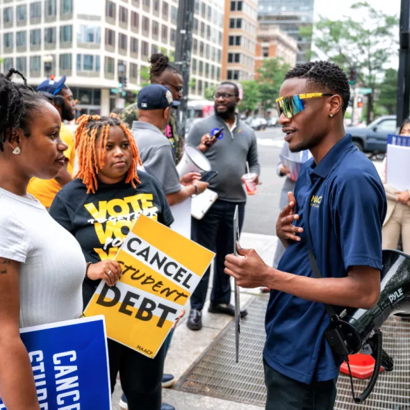 Derrick Lewis Talking to NAACP Members at Rally