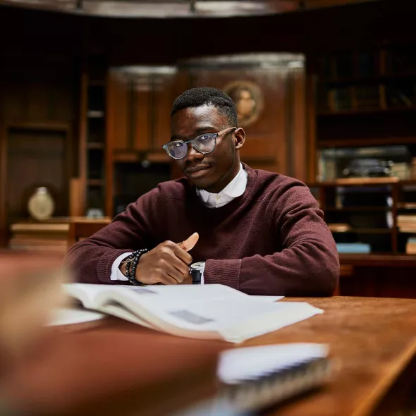 Young Black Student in Library