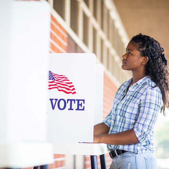 Young Black Female at Voting Booth
