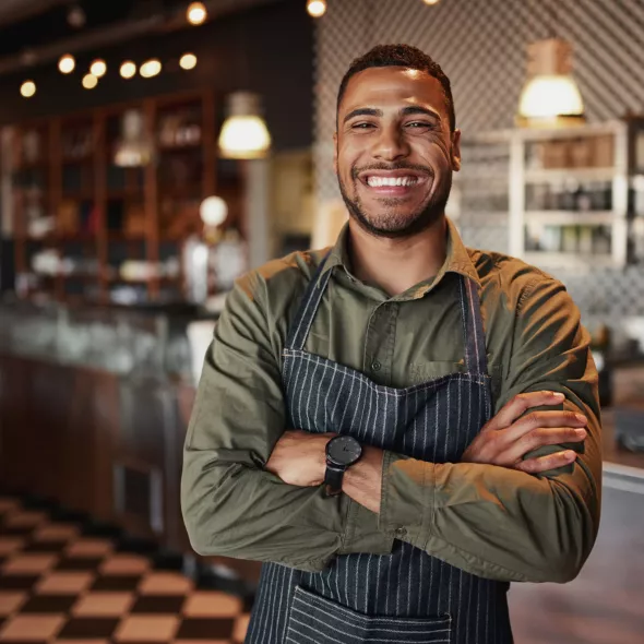 Smiling Restaurant Worker Wearing Apron