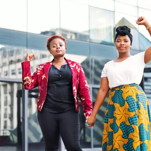 Young Black Females - Outdoors - Holding Hands and Raising Fists