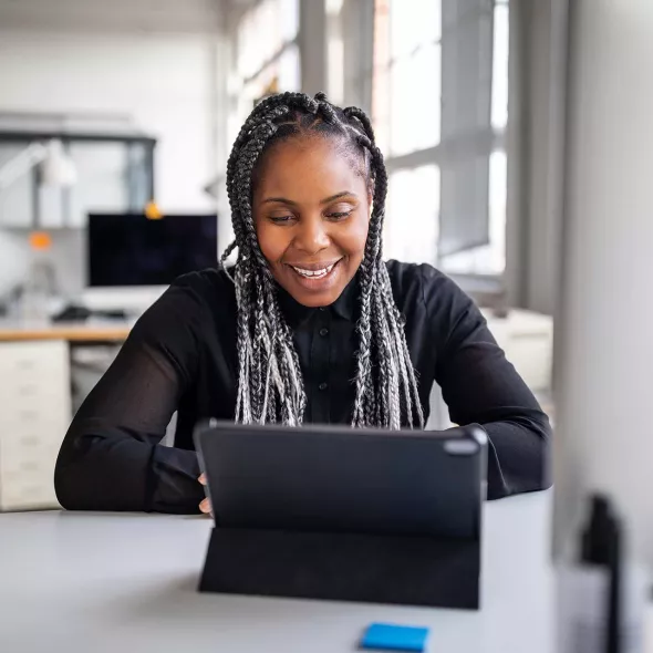 Black Female - Solo - Working on Laptop