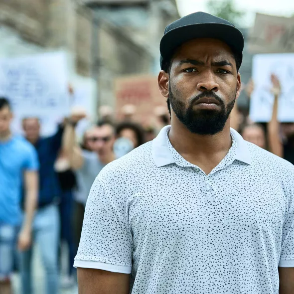 Black Man Standing in Solidarity with Protesters