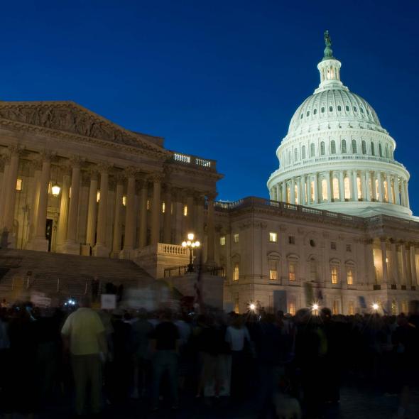 The U.S. Capitol Building at Night - Crowd of People Outside