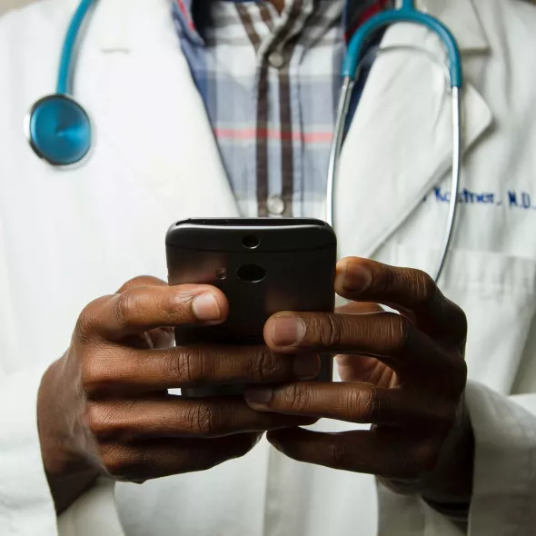 Close-up - Black Male Hands - Doctor - Holding Cell Phone