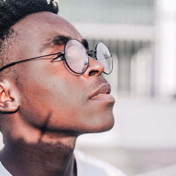 Close-up - Young Black Male Outdoors - side profile