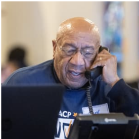 An NAACP volunteer calling voters 