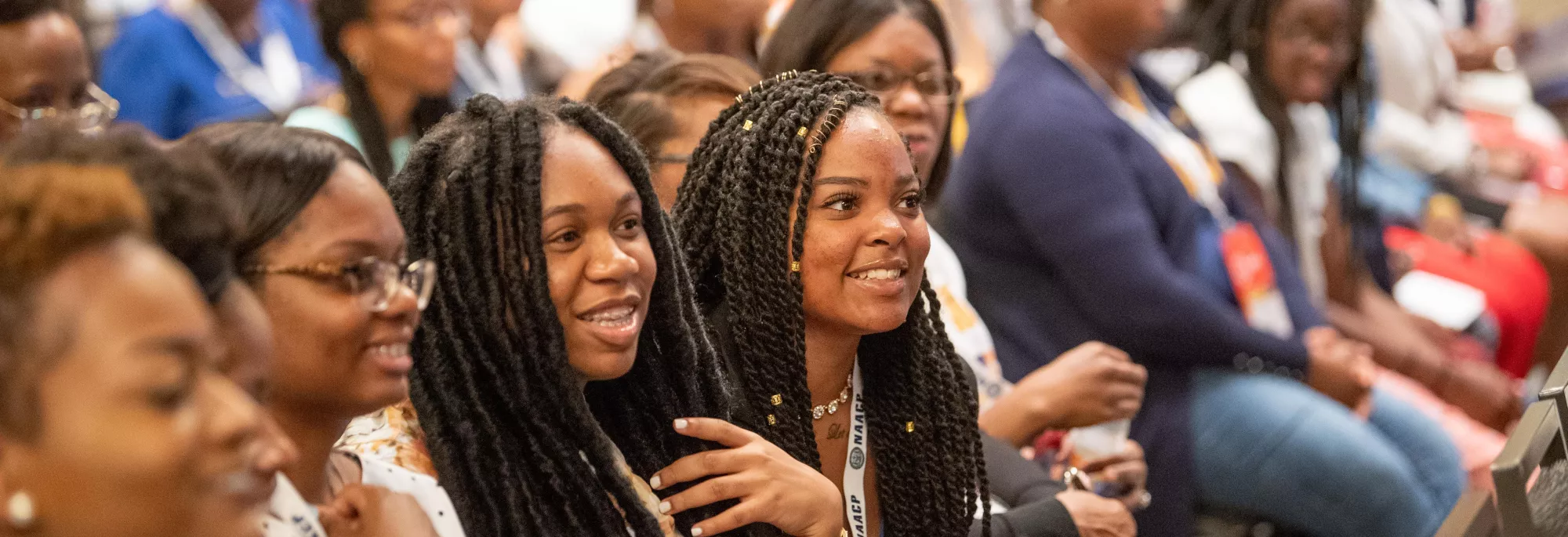 Young Black Female Students at Conference