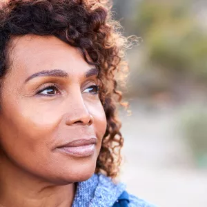 Close-up Black Female - Outdoors - Slight Smile
