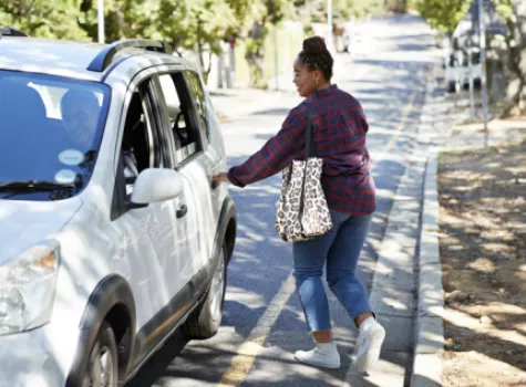 Student Getting Into Uber