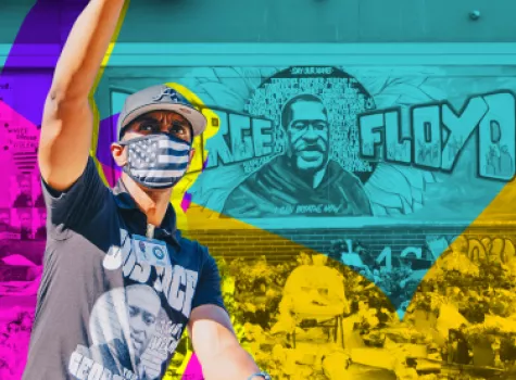Man with hand raised in front of George Floyd Sign - Styled Home