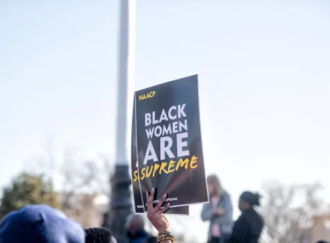 Holding Black Women are Supreme Sign Up